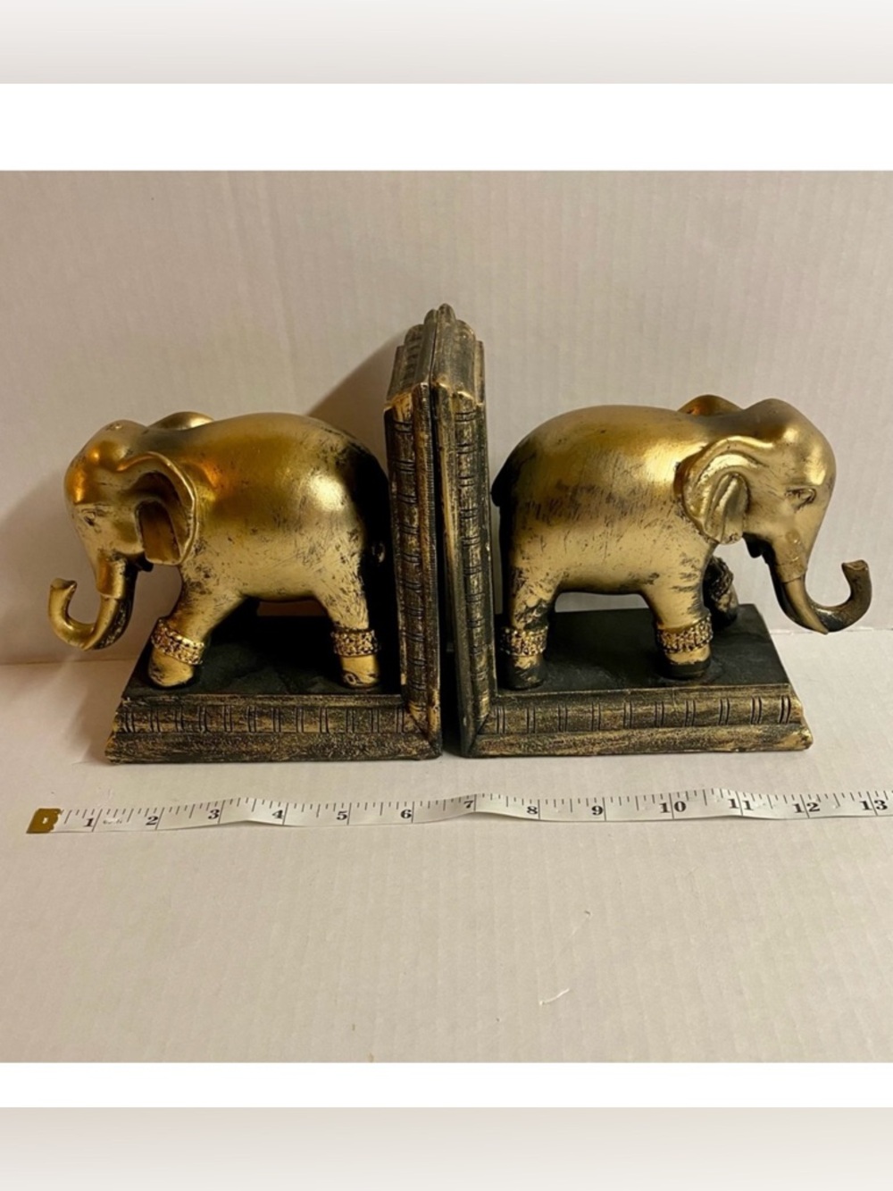 Danya B. Gold painted elephant bookends.In excellent condition.